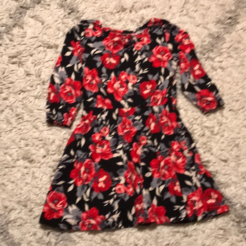 Children place black with roses skater dress size 10/12.